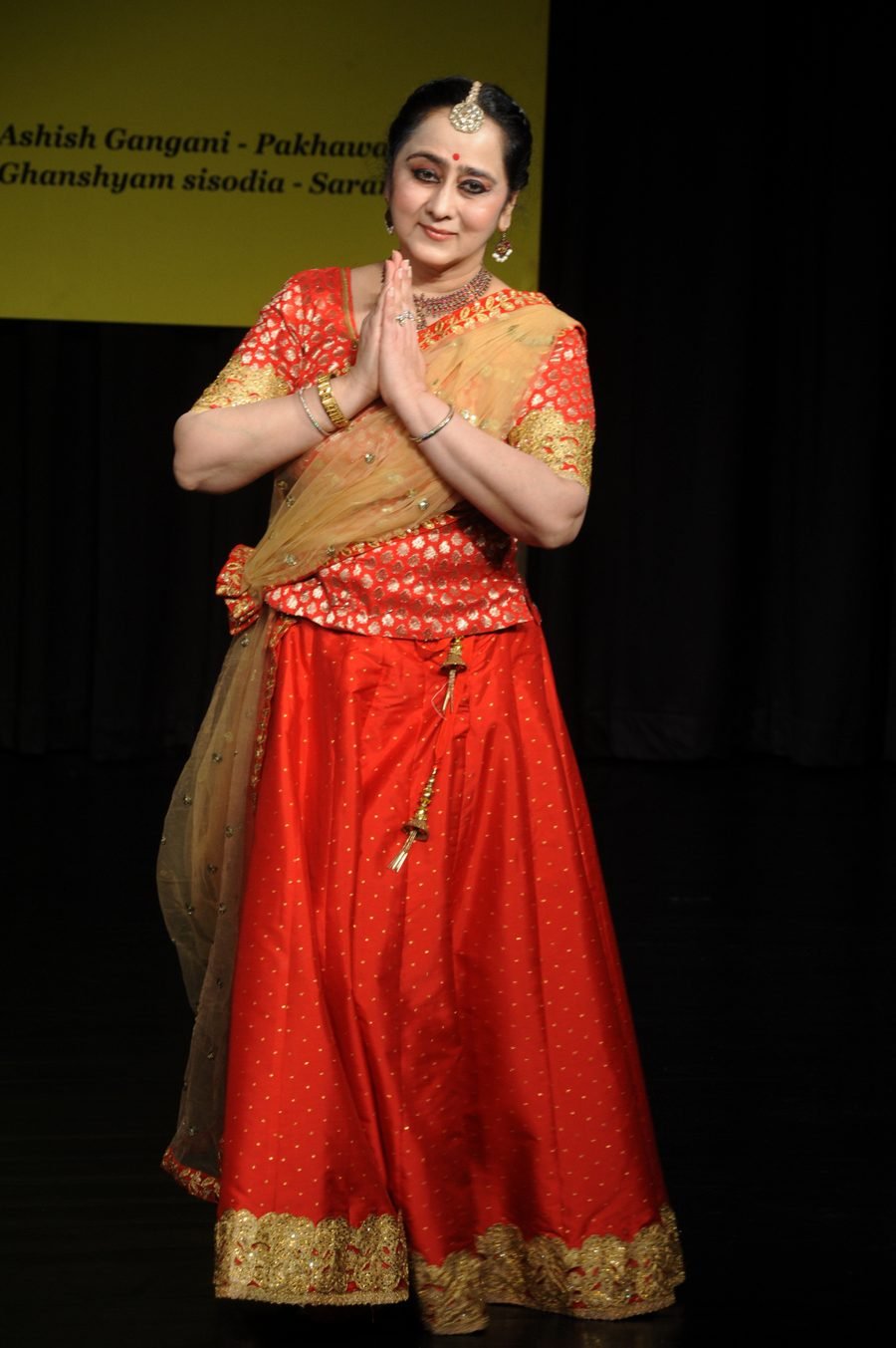 Asavari greeting the audience with namaste